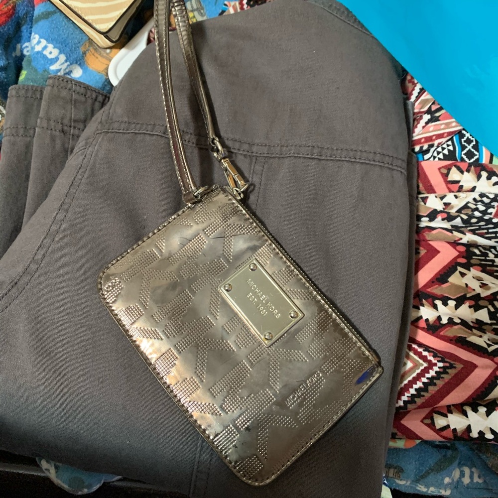 Well loved MK wristlet